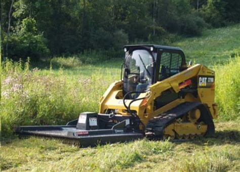 brush cutting uneven ground with a skid steer|skid steer brush cutting.